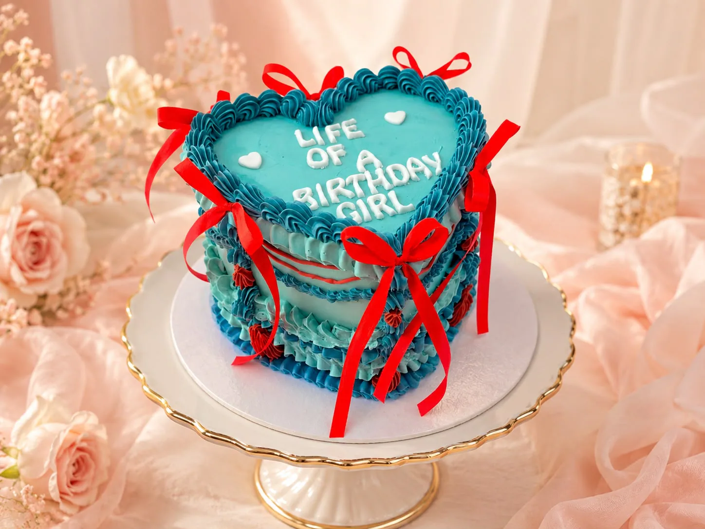 Women’s heart-shaped birthday cake handmade by Anila in Norwich