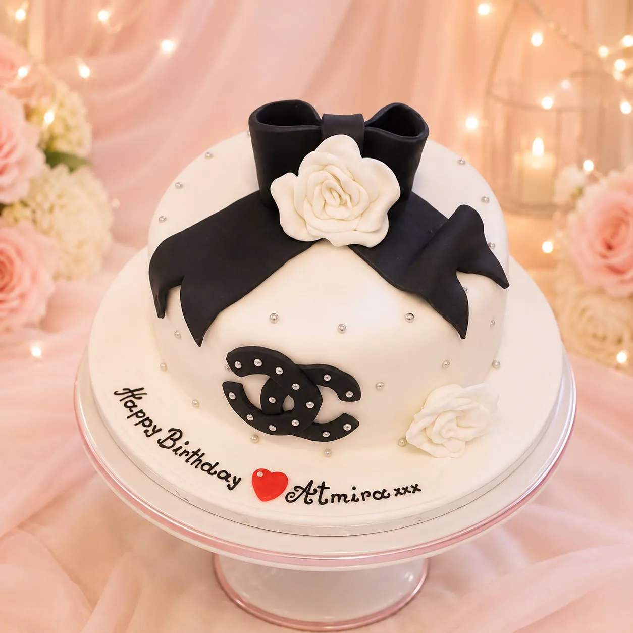 Women’s black bow fashion cake handmade by Anila in Norwich